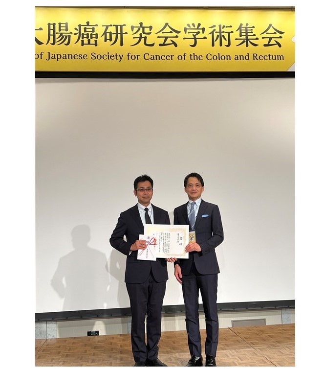 五井孝憲世話人(右)菊家健太研究科学生